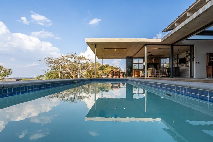 For Sale: House in The Hills Game Reserve Estate with pool, boma, and solar system.