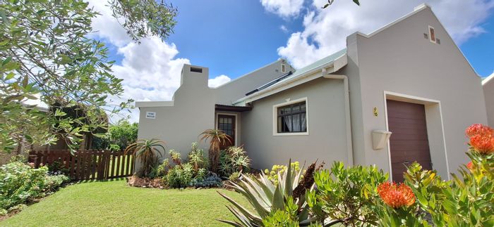 For Sale: 2-Bedroom Townhouse in Riversdale Central with veranda, garage, and garden.