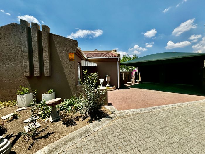 For Sale: Townhouse in Secunda Central with 3 bedrooms, double garage, and garden.