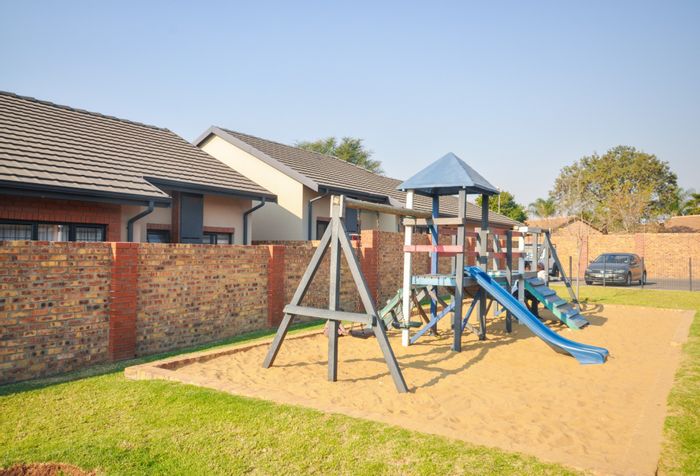 Equestria Townhouse For Sale: 3 beds, 2 baths, double garage, pool access.