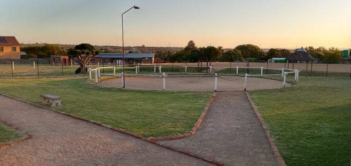 Equestrian house for sale in Mnandi with arenas, stables, and spacious living.