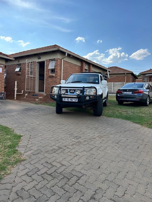 For Sale: 3-bedroom house in Olievenhoutbosch with garden, garage, and playground access.