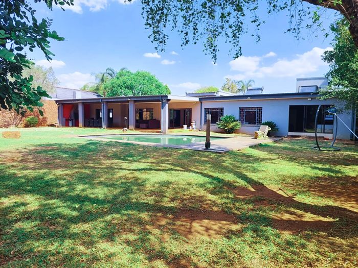 Eldoraigne House For Sale: Spacious 4-bedroom home with multiple living areas.