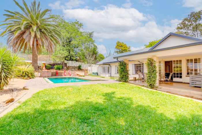 Bryanston House For Sale: Spacious living, pool, cottage, solar system, and garage.