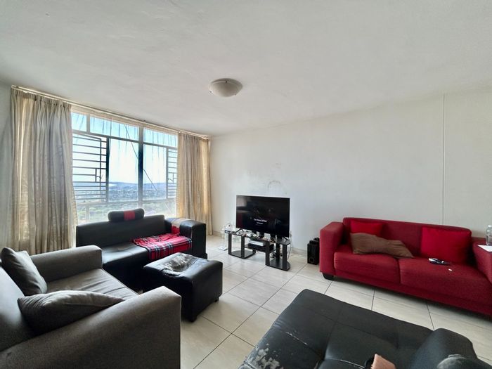 La Montagne Apartment For Sale: 2 bedrooms, open-plan living, modern kitchen, en-suite.