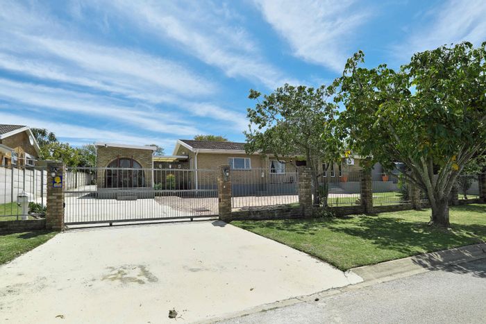 For Sale: House in Sunridge Park with pool, studio, and sustainable features.