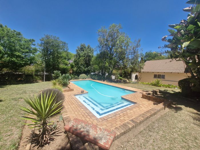 Bryanston House For Sale: Secure area, pool, garden, and entertainment spaces.