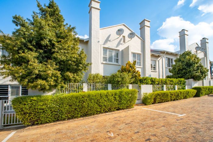 For Sale: Bryanston Townhouse with pool, garden, and 24-hour security access.
