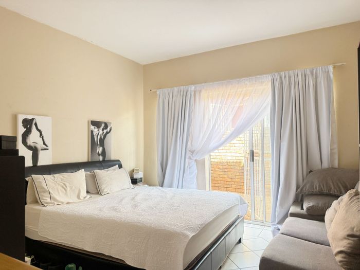 Highveld Apartment For Sale: Ground floor, private garden, close to amenities.