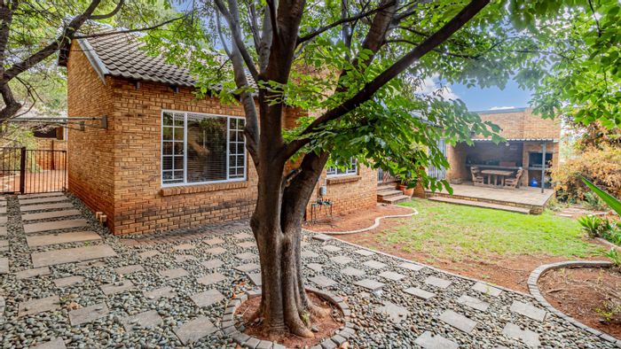 For Sale: Weltevreden Park Townhouse with open-plan living, pet-friendly garden, and secure parking.