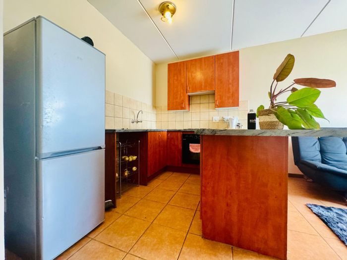 1-Bedroom Apartment For Sale in Grand Central, near Gautrain and shopping amenities.