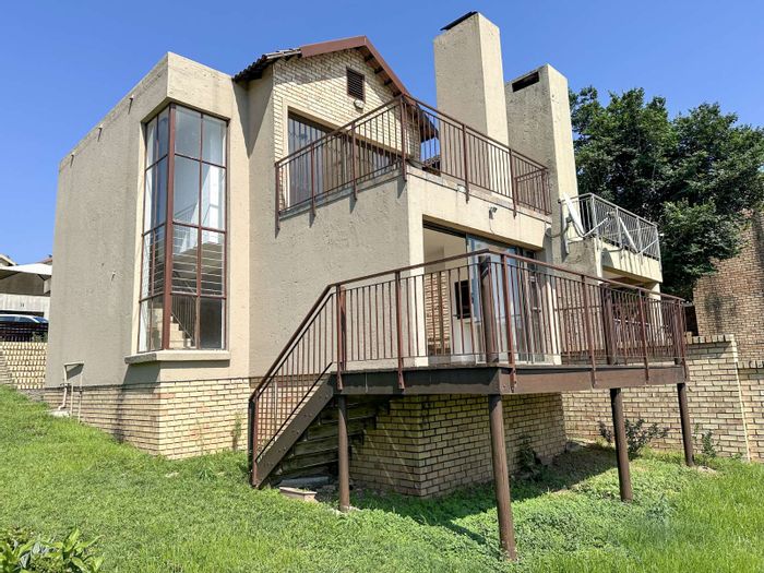 For Sale: Townhouse in Stonehenge Ext 7 with open-plan living, garage, and braai.