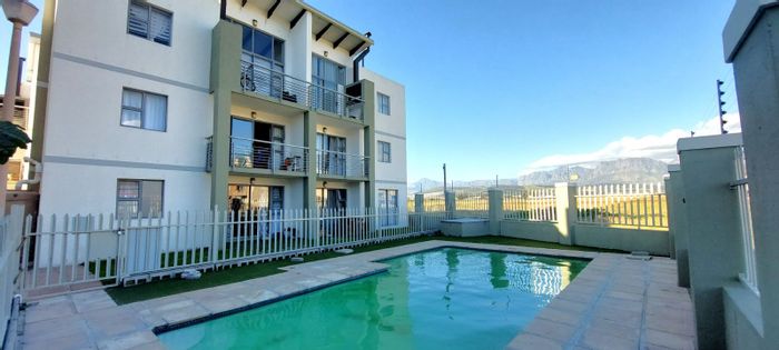 For Sale: Apartment in Whispering Pines with pool, braai area, and beach access.