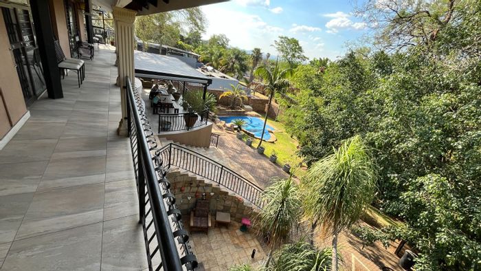 For Sale: Guest House in Montana Park with 10 en-suite bedrooms, pool, and cottage.