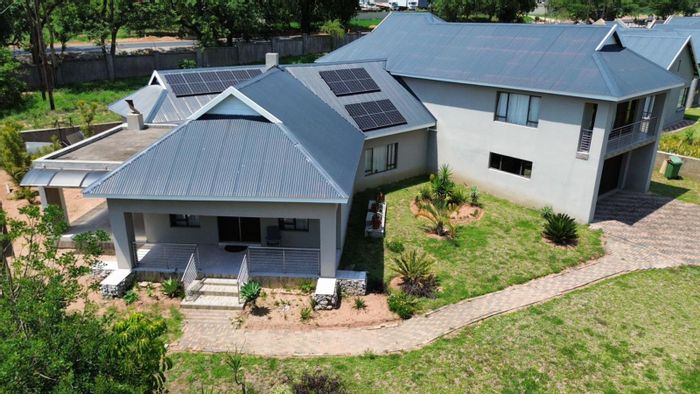 House for Sale in Sabie River Eco Estate: 3 beds, solar panels, outdoor braai.