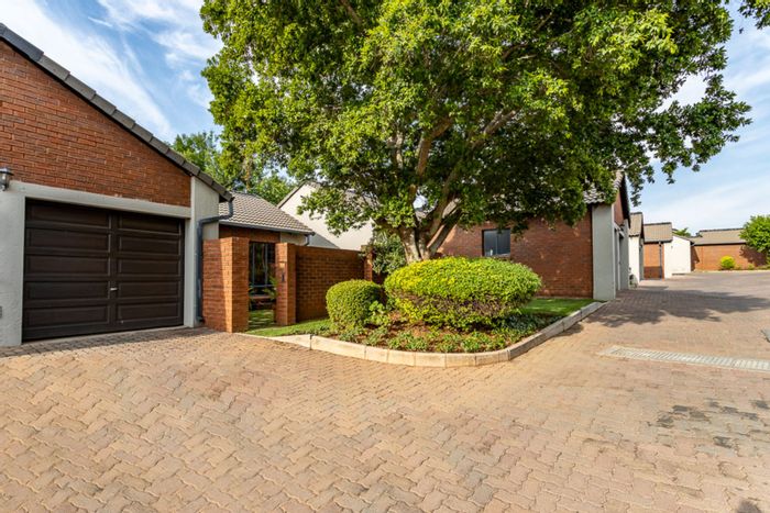 For Sale: Spacious 3-Bedroom Townhouse in Mooikloof Ridge with Garden and Double Garage.