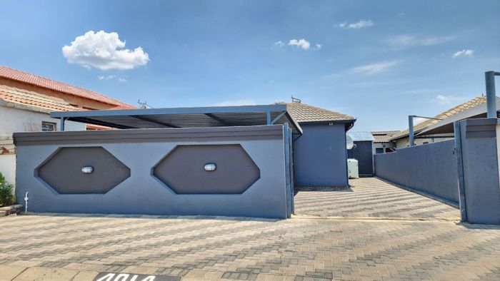 For Sale: House in Riverside View Ext 35 with spacious yard, CCTV, and Wendy house.