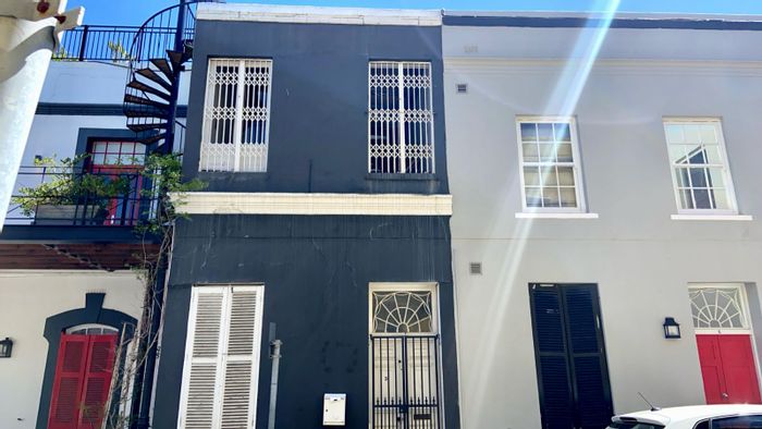 De Waterkant Townhouse For Sale: Blank slate, prime location, development potential awaits.