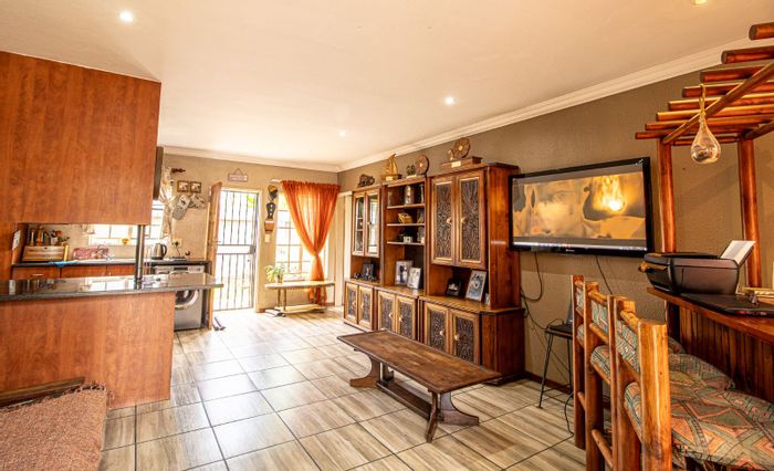 Spacious Annlin Townhouse for Sale with private garden and ample parking.