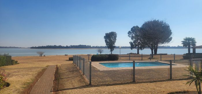 House For Sale in Vaal Marina Central: Waterfront access, communal pool, secure estate.