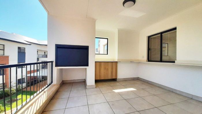 Three-bedroom apartment to rent in Ballito Central with amenities and security features.