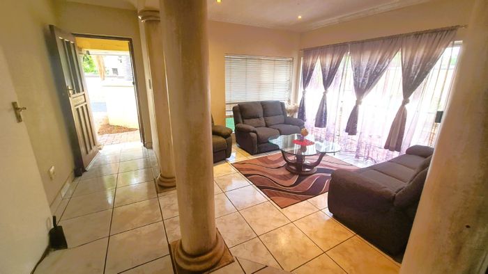 Highveld House For Sale: Secure estate, open-plan living, garden, and scullery.