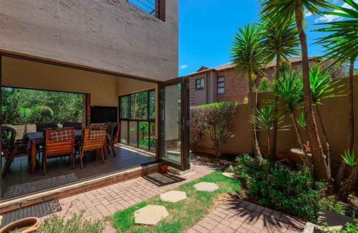 For Sale: Townhouse in Ruimsig Country Estate with pool, garden, and pet-friendly amenities.