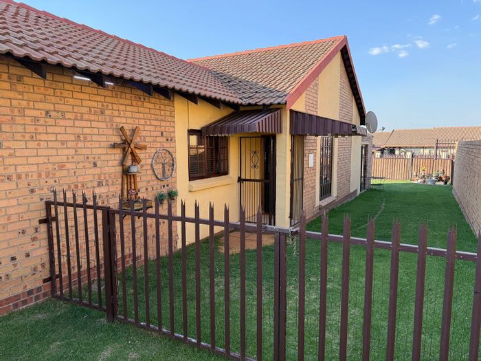 For Sale: Townhouse in Secunda Central with garden, solar system, and indoor braai.