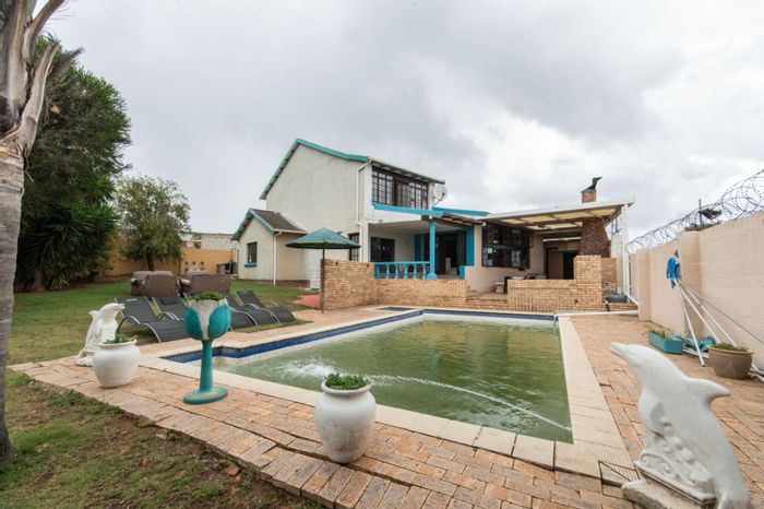 Hillside House For Sale: 4 bedrooms, pool, braai area, double garage, security features.