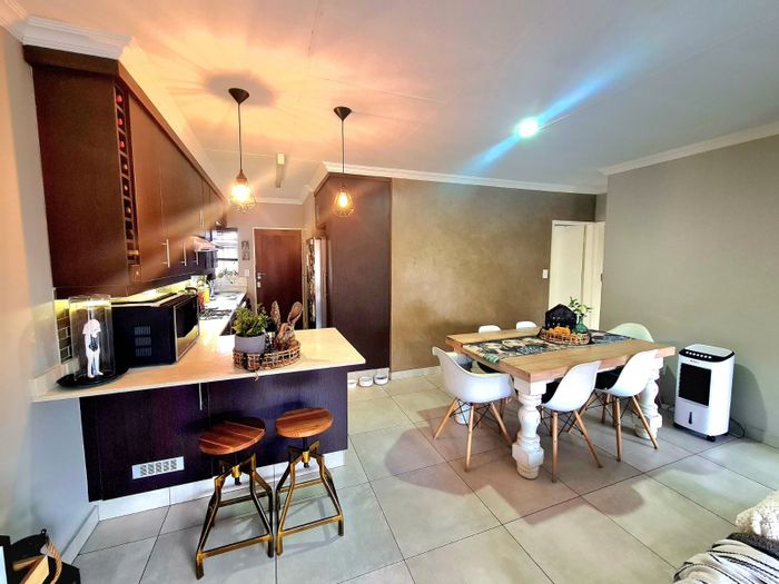 For Sale: Townhouse in Wierdaglen Estate with double garage, security, and outdoor braai.