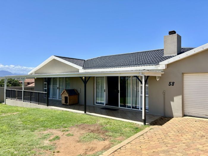 For Sale: Spacious 4-Bedroom House in Hartenbos Heuwels with Open-Plan Living.