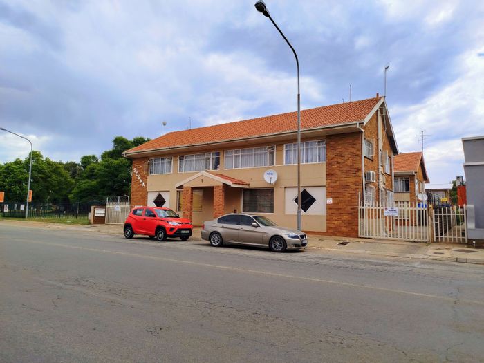 For Sale: 2-Bedroom Apartment in Potchefstroom Central with Business Rights and Security.