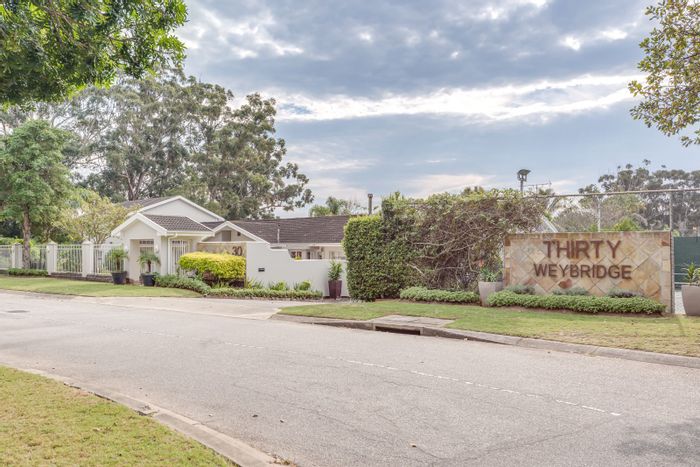 Weybridge Park House For Sale: Pool, tennis court, BBQ area, and solar system.