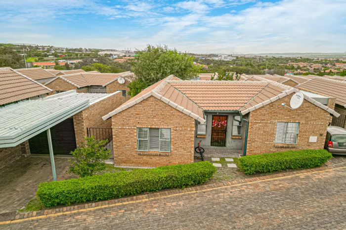 2-Bedroom Townhouse in Halfway Gardens with Pool, Garage, and 24-Hour Security For Sale.