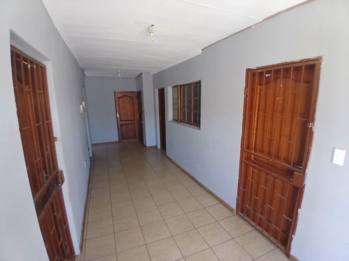 For Sale: Spacious Seshego Apartment with pool, parking, and convenient access.