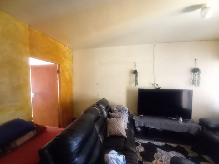 2-Bedroom Apartment For Sale in Benoni Central with secure parking and amenities.
