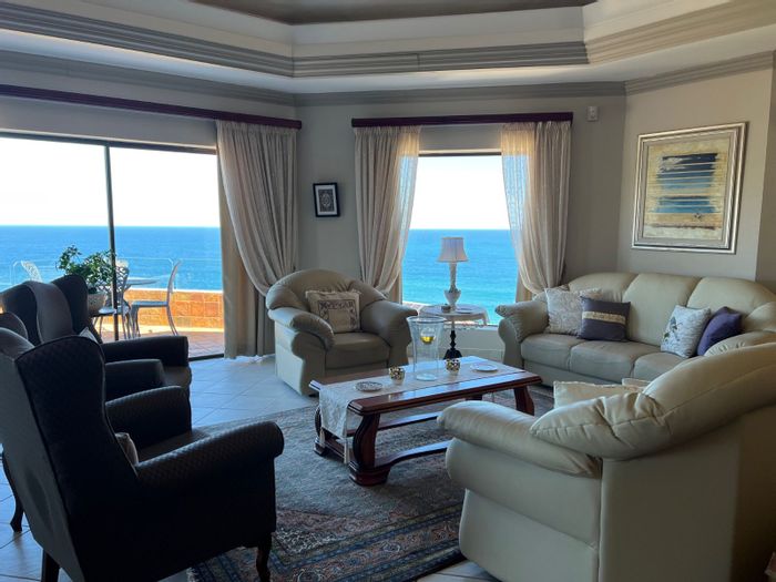 4-Bedroom House For Sale in Mossel Bay Golf Estate with Ocean Views and Garages.