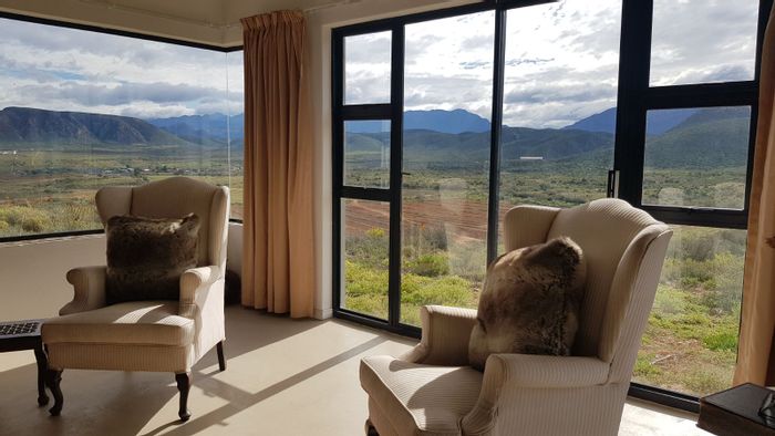 Calitzdorp Rural House For Sale: Off-grid living, mountain views, spacious layout.