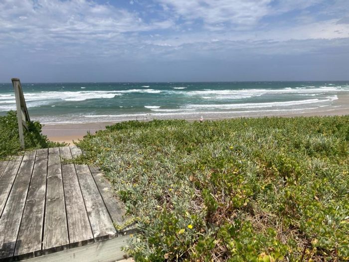 For Sale: Beachfront house in Myoli Beach with 6 bedrooms, pool, and braai area.