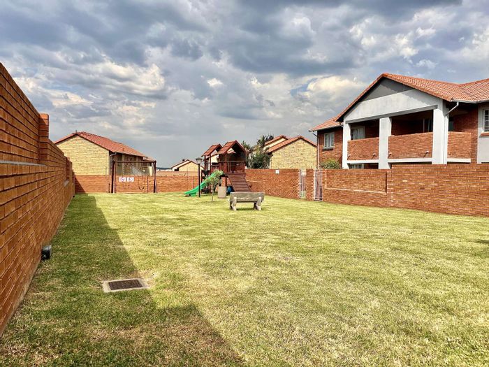 3-Bedroom Townhouse for Sale in Monavoni with Garden, Garage, and Security Features.