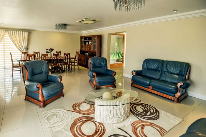 For Sale: Spacious 6-bedroom house in Charleston Hill with entertainment area and security.