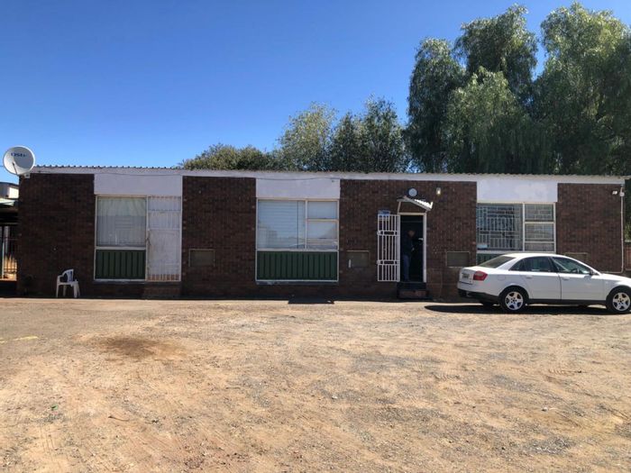 Industrial property for sale in Ashburnham with office, warehouse, and storage spaces.