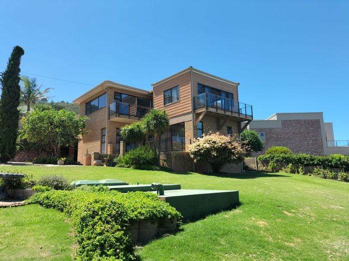 For Sale: House in Glentana with sea views, garden, and double garage.