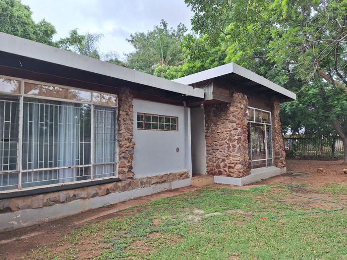 For Sale: Income-Generating House in Bela Bela Central with Multiple Flats and Parking.