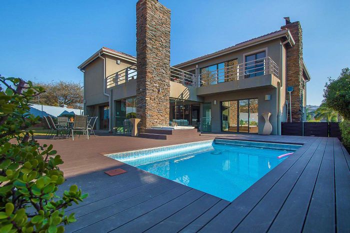 For Sale: 4-Bedroom House in Ruimsig with Pool, Gym, and Golf Estate Access.