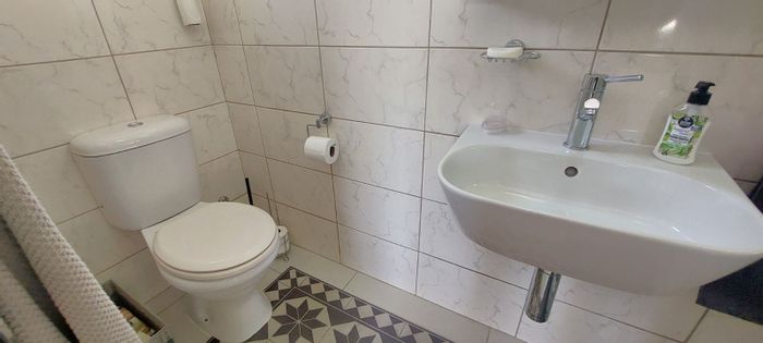For Sale: House in Fairview Golf Estate with pool, office, and solar features.