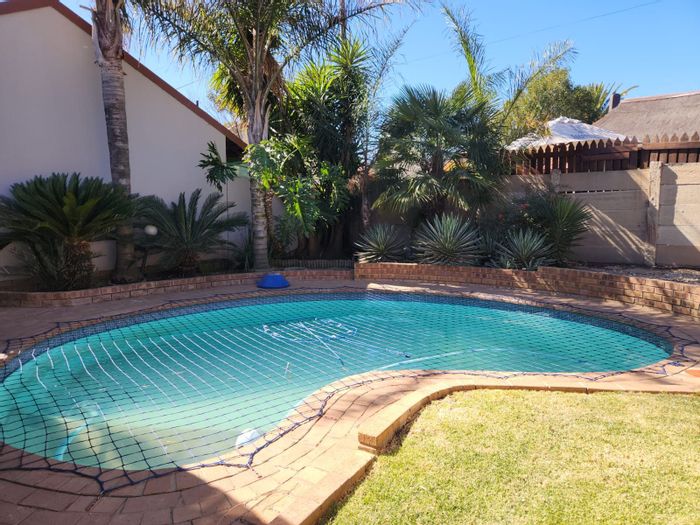 4-Bedroom House For Sale in Secunda Central with pool, braai areas, and double garage.