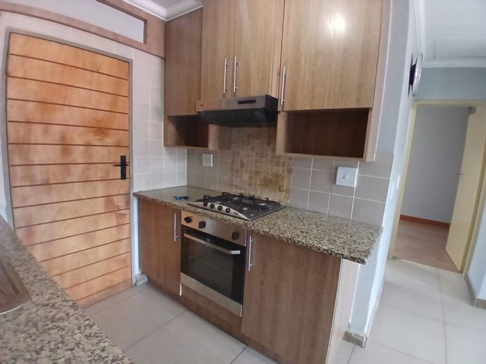 House To Rent in Waverley: 2 Bedrooms, secure complex, gas stove, private patio.