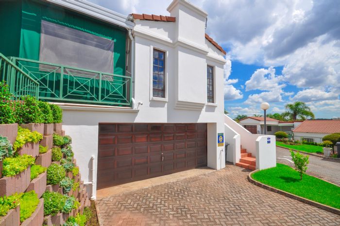 Erasmuskloof Townhouse For Sale: 2 beds, garage, patio with braai, secure complex.