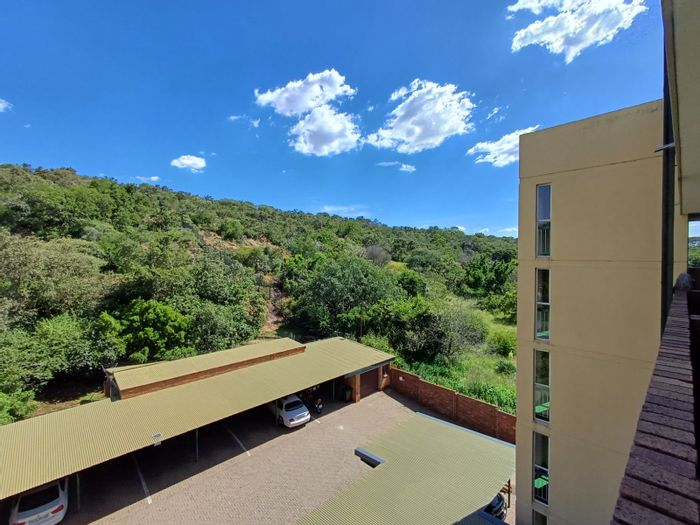 For Sale: Silverton Apartment with Scenic Views, Balcony, Lift Access, and Carport.